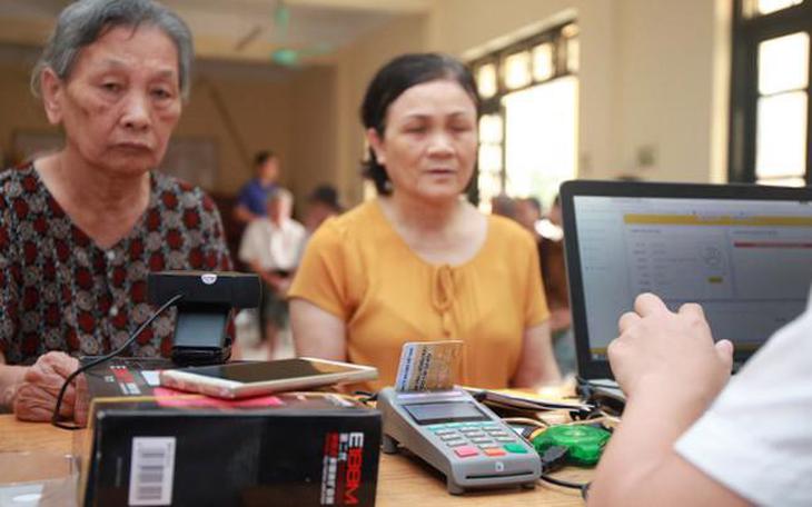 Hà Nội phát động cao điểm tích hợp tài khoản an sinh xã hội trên VNeID- Ảnh 2.